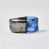 ANILLO MARINO EN VIDRIO Y OTRO BLANCO