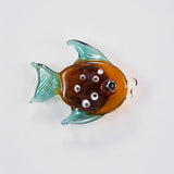 CUBRE BOTÓN NEMO VIDRIO Y ORO BLANCO